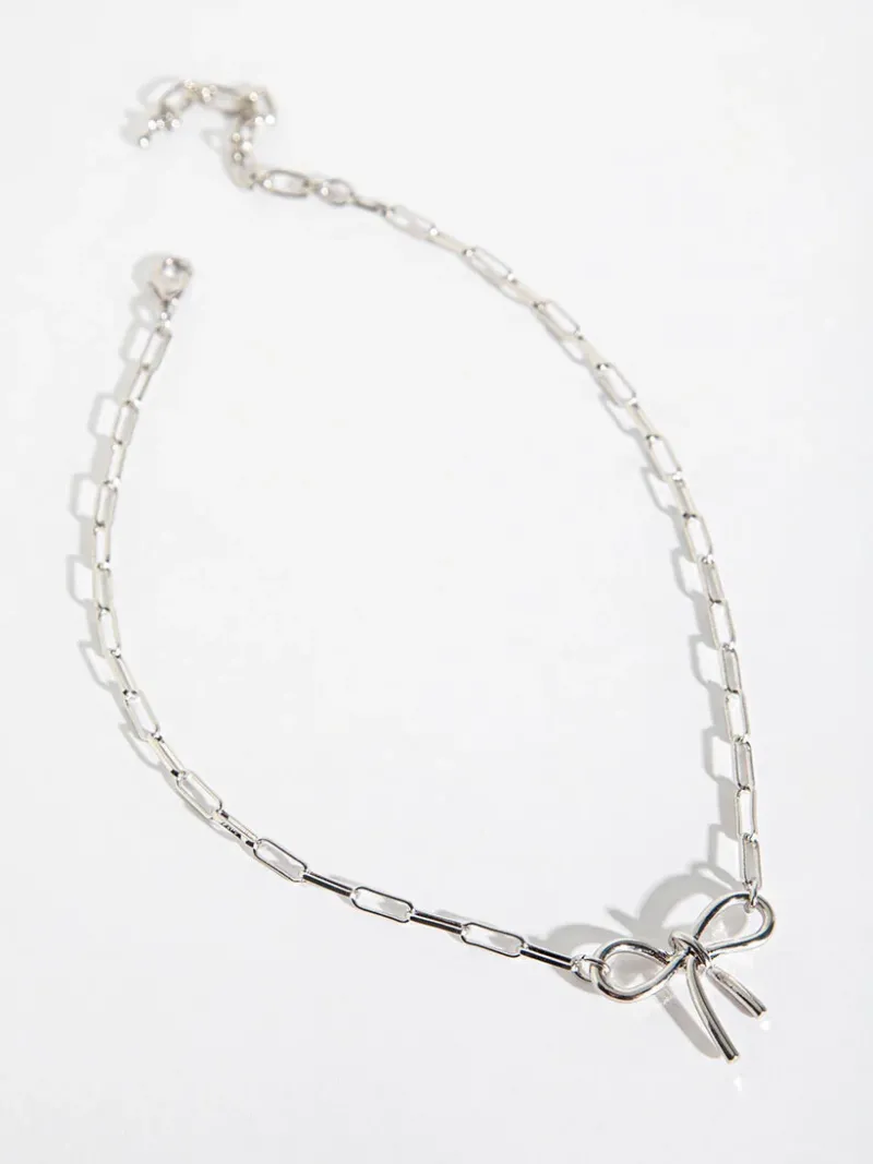 bow_paper_clip_necklace_0-1.webp Ricki's Necklaces*Bow Paper Clip Necklace