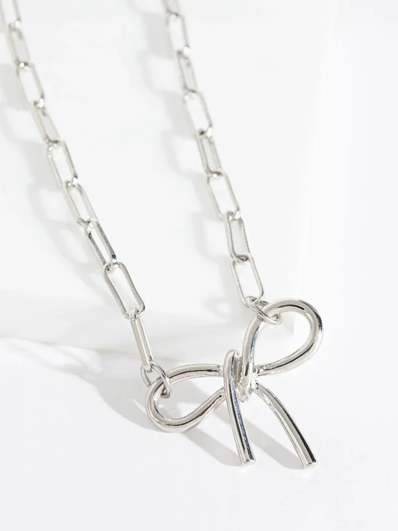 bow_paper_clip_necklace_1-1.webp Ricki's Necklaces*Bow Paper Clip Necklace