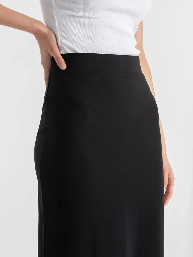 knit_black_midi_skirt_2.webp Ricki's Skirts & Shorts*Knit Midi Skirt