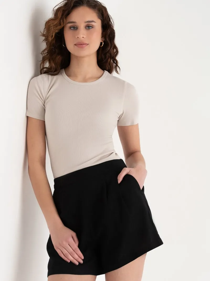 short_sleeve_ribbed_crew__0-17.webp Ricki's Shirts & Blouses*Short Sleeve Ribbed Crew Neck Top